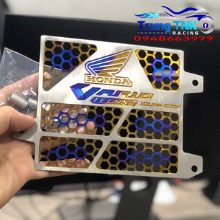 Che két nước titan gắn vario.