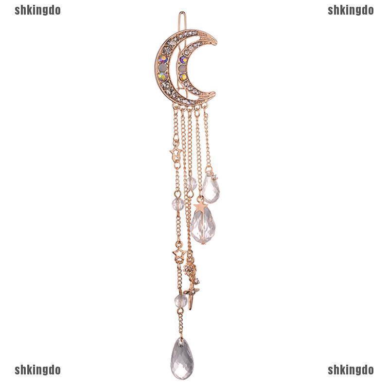 Kẹp tóc hình mặt trăng đính pha lê phối tua rua dài thời trang