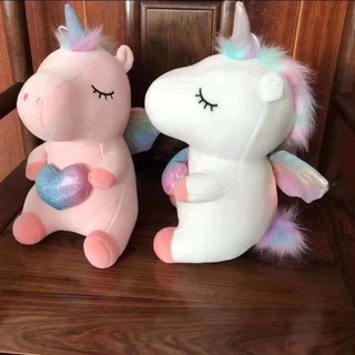 Gấu bông Unicorn ôm tim kim sa