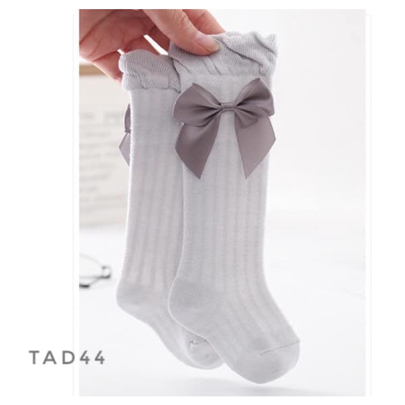 Tất lưới đùi đính nơ cho bé gái TAD44