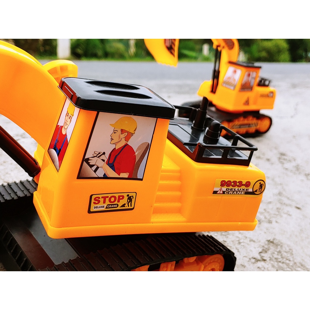 Đồ chơi trẻ em xe máy xúc xoay 360 có tay điều khiển khớp múc, chạy bánh đà cho bé