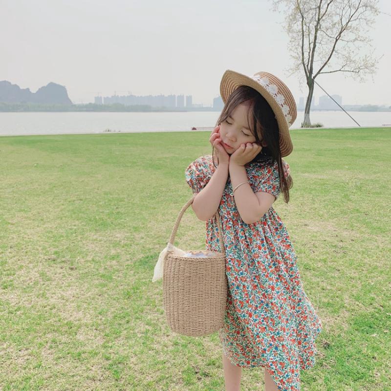 Đầm hoa hở lưng cho bé gái