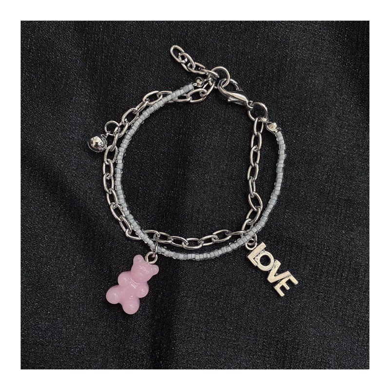 Vòng cườm trắng mix charm