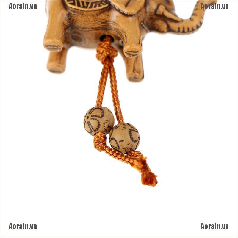 Móc khóa hình con voi điêu khắc bằng gỗ