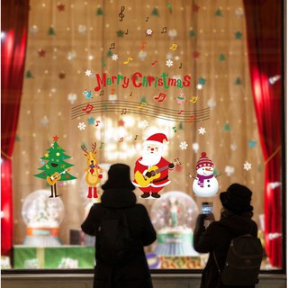 Decal dán tường Ông già noel đánh đàn