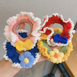 Cột tóc len hoa handmade