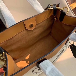 Túi Coach vải bố phối da