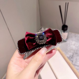 Kẹp mái bật nơ nhung đính đá