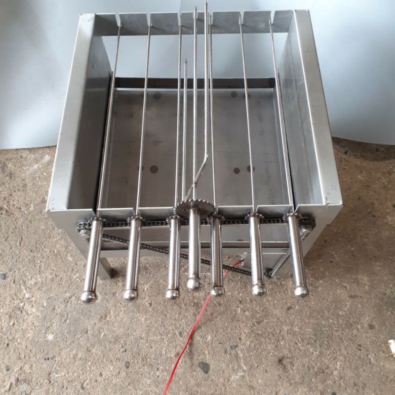 Máy nướng thịt chả quay gà vịt tự động bằng inox 6 xiên