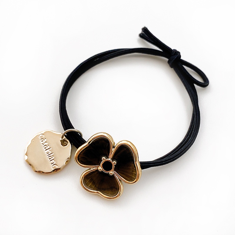 Dây buộc tóc co giãn mặt hình cỏ ba lá thời trang dành cho nữ