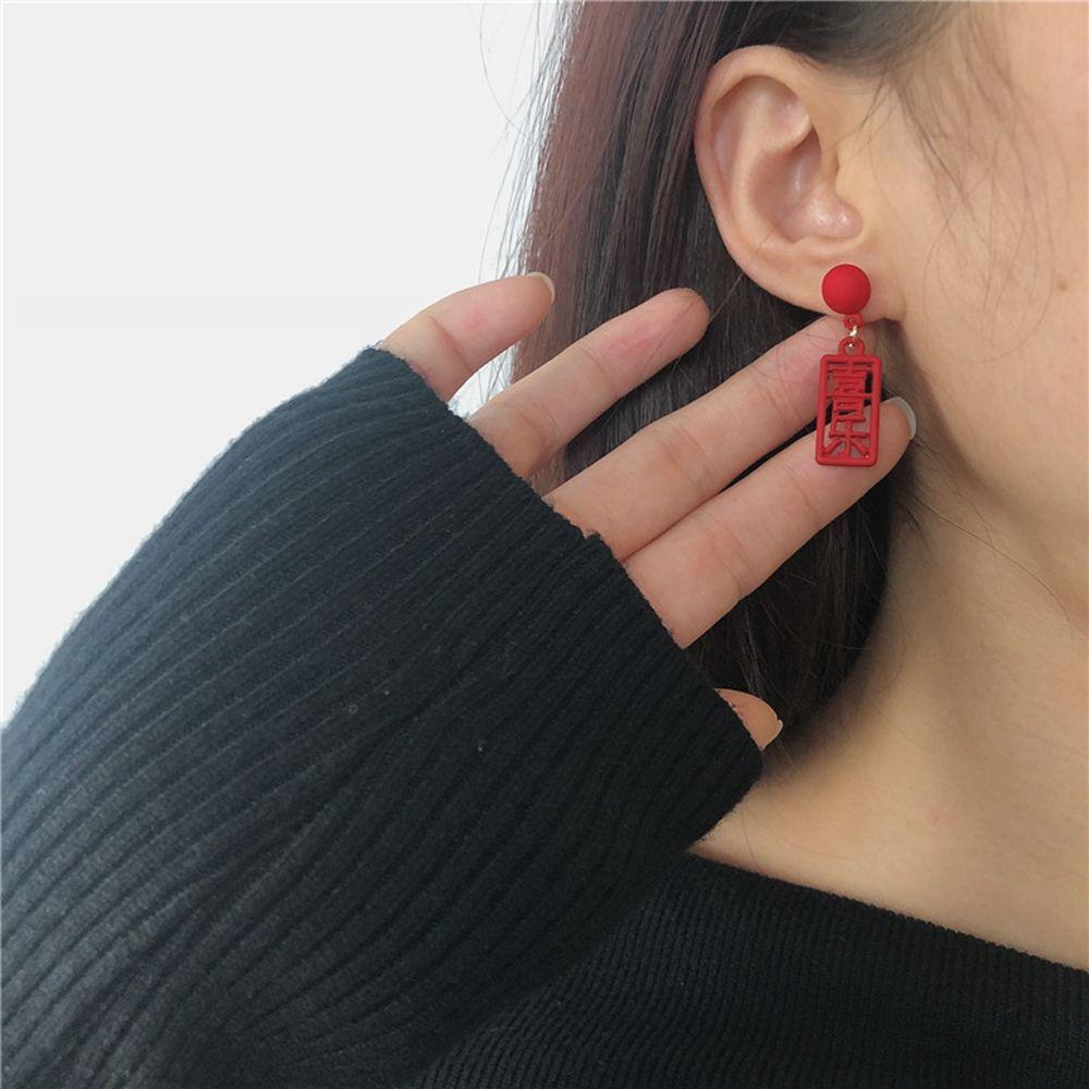 Bông Tai Mừng Năm Mới Thiết Kế Ngọt Ngào Cho Nữ