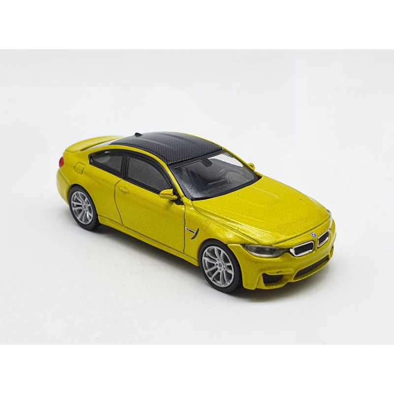 Xe Mô Hình BMW M4  Austin Yellow Metalic LHD 1:64 Mini GT