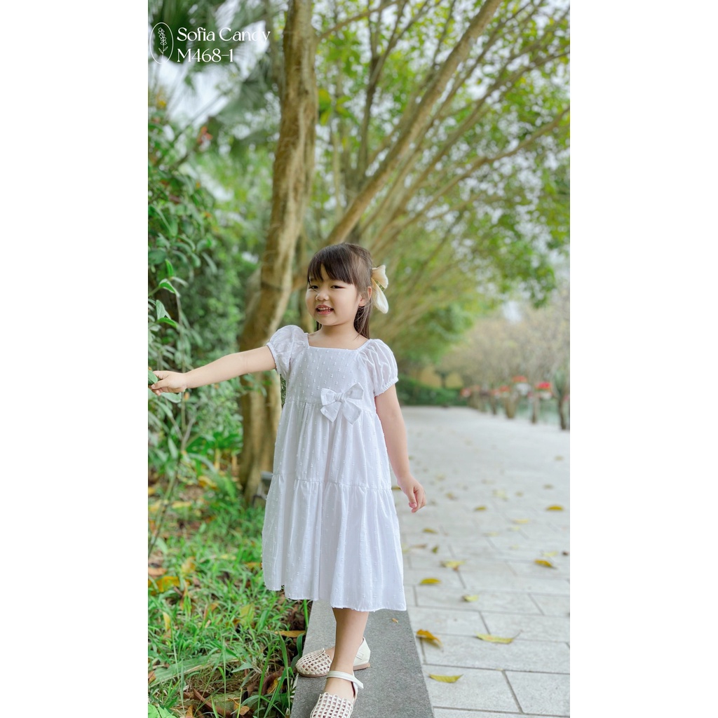 ĐẦM VẢI SOFIA ĐÍNH NƠ TAY BỒNG ĐÁNG YÊU CHO BÉ 9-33KG - BIGBABY SHOP