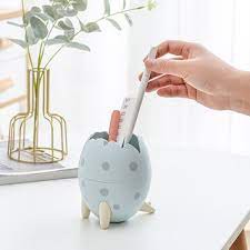 Trứng khủng long đựng bút,đựng đồ trang điểm để bàn (có sỉ)