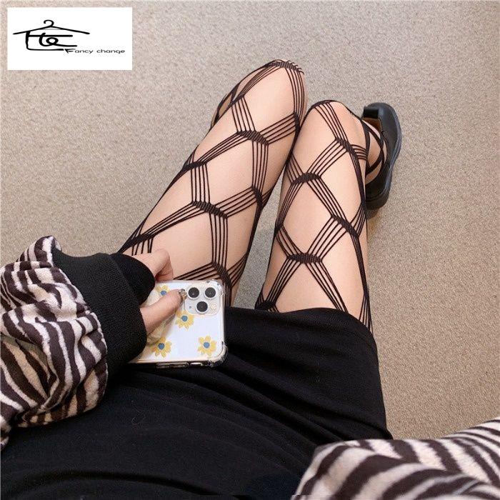 Vớ Lưới Xuyên Thấu Cao Qua Gối Thiết Kế Khoét Lỗ Màu Đen Quyến Rũ Cho Nữ