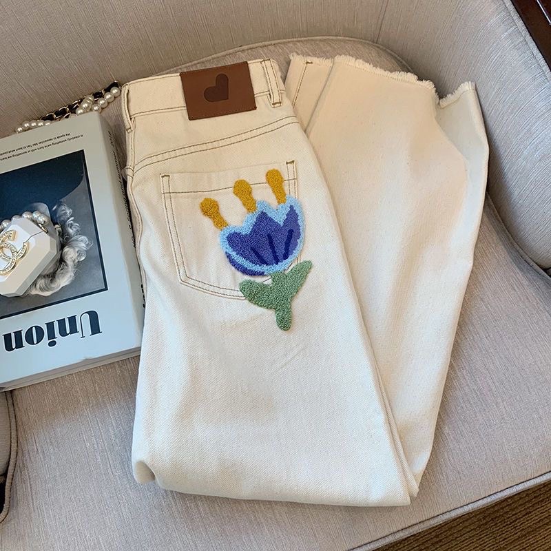 Quần jeans trắng lưng cao ống rộng hoạ tiết cho nữ