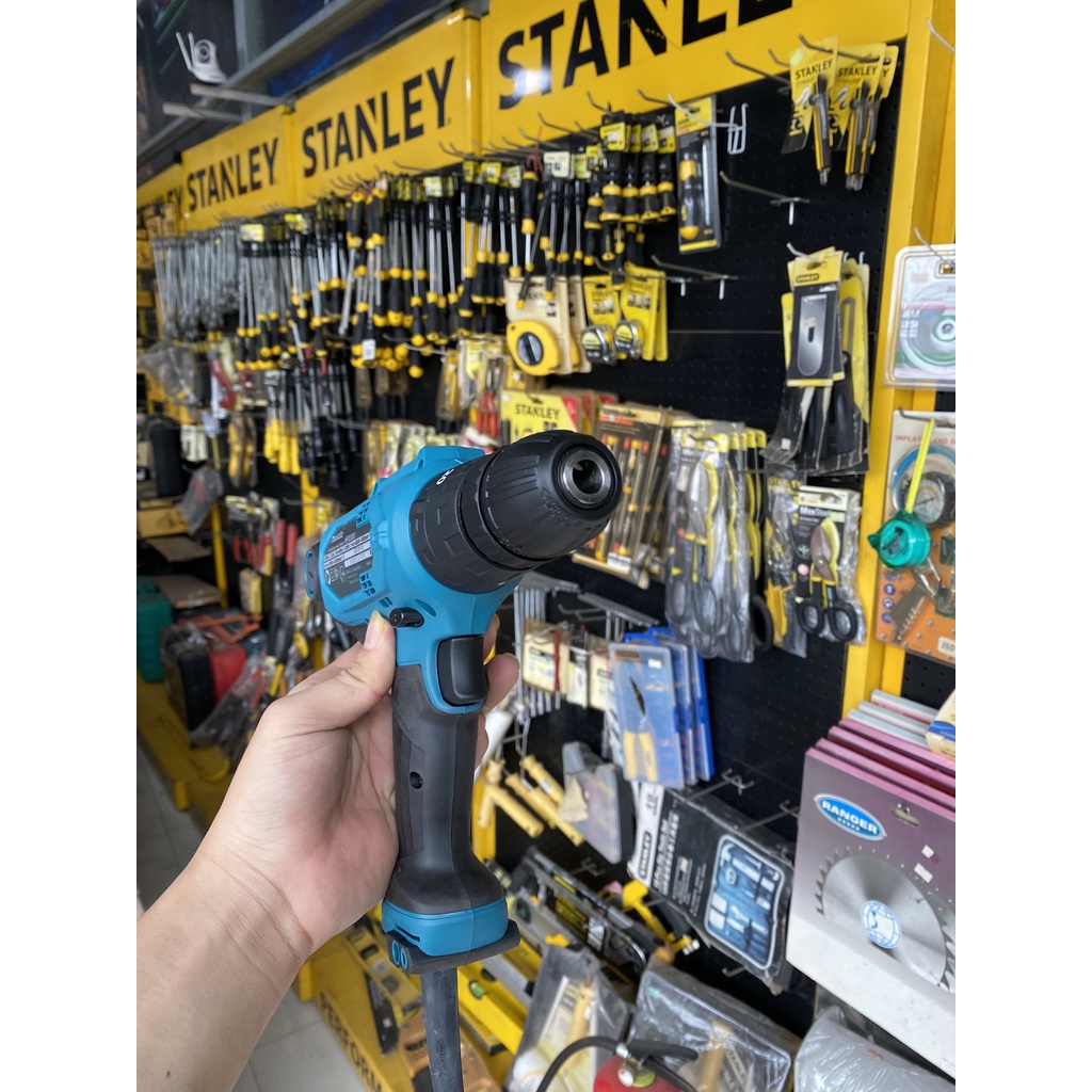Máy khoan búa và vặn vít Makita  HP0300