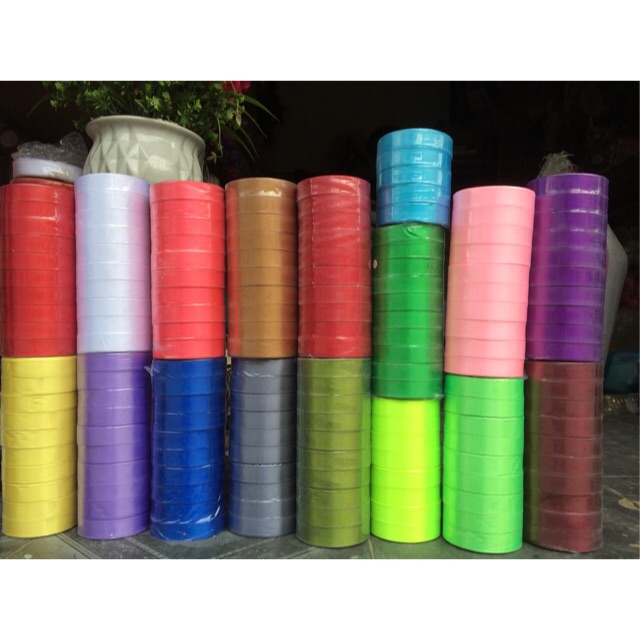 1 lố 10 cuộn Ruybang lụa 1 màu 2 Cm