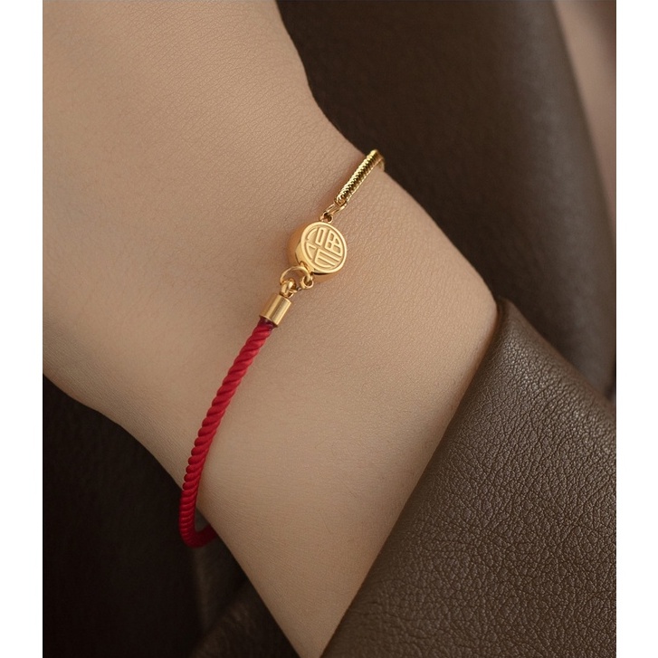 Vòng tay titan phối dây đỏ mặt chữ Phúc không gỉ