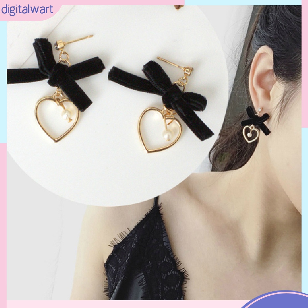 Đôi khuyên tai phối nơ và trái tim rỗng thời trang cho nữ