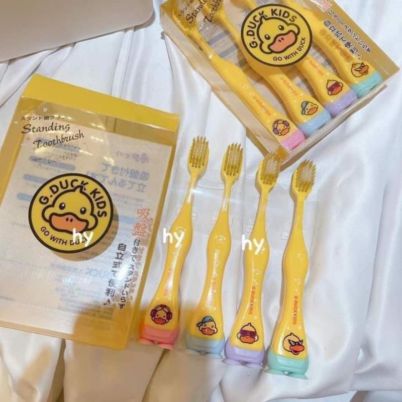 Hộp 4 BÀN CHẢI G.DUCK vịt vàng sợi mềm an toàn cho bé-ND