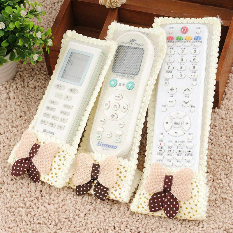 Bao  Bọc Chống Bụi Bảo Vệ Các Loại Remote , Tivi , Máy Lạnh ,... Hình Chiếc Nơ Và Chú Gấu
