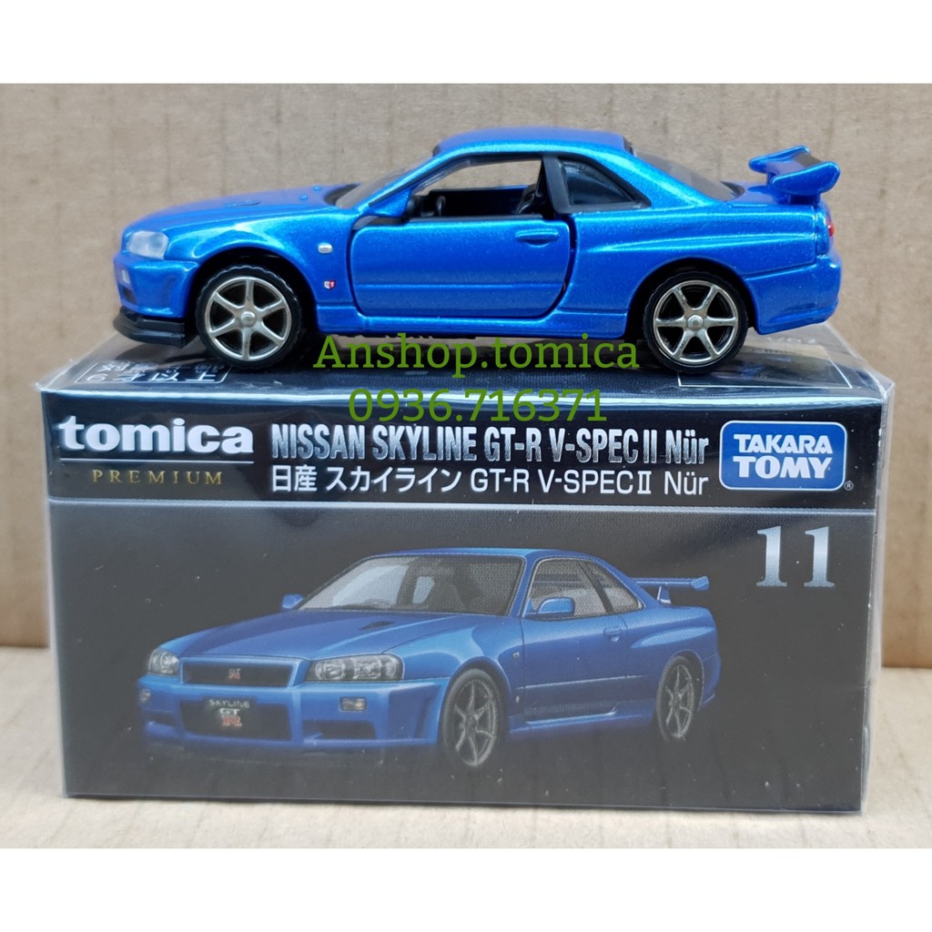 Mô hình xe  Nissan màu xanh mở được cửa Premium tomica Nhật Bản