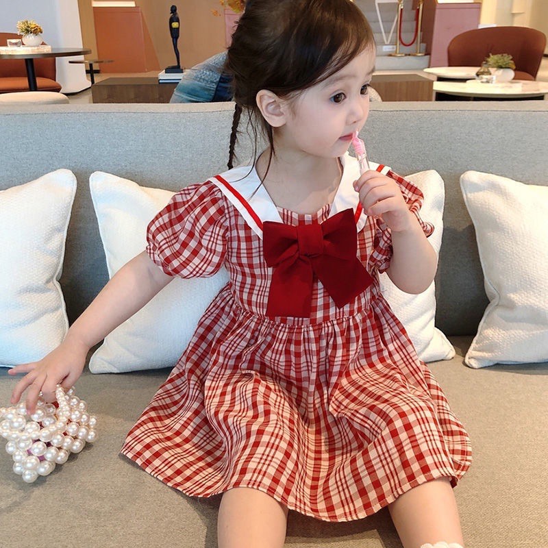 Váy bé gái kẻ caro đỏ cao cấp đính nơ đầm xoè cổ bẻ cộc tay