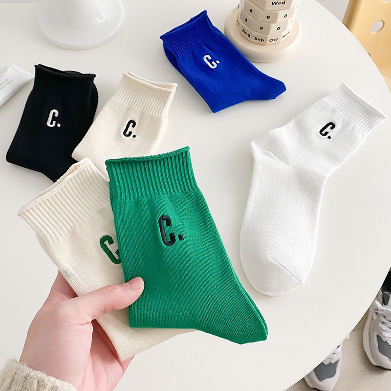 Vớ cotton thời trang giữa bắp chân màu trơn có chữ cho nữ