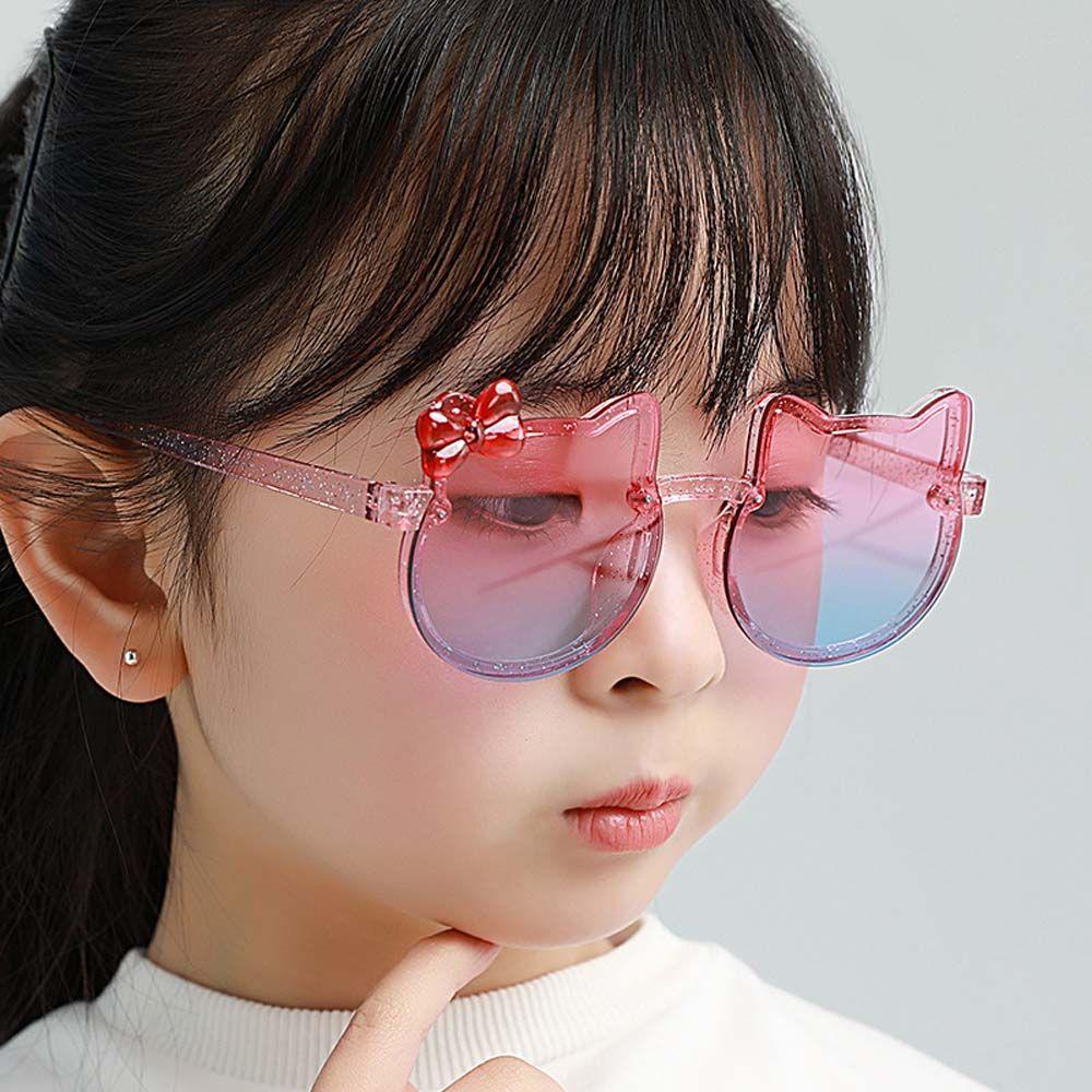 Kính Mát Hình Mắt Mèo Đính Nơ Dễ Thương Cho Bé Gái