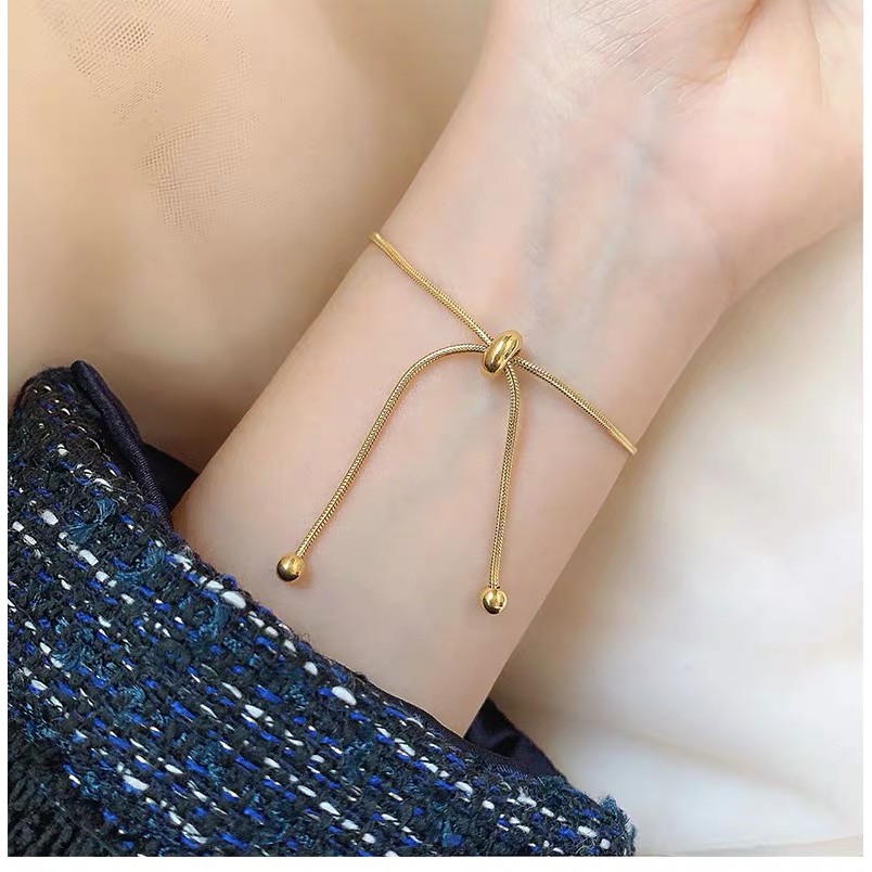 Dây chuyền bằng thép titan mạ vàng hồng 18K họa tiết xương rắn phối hạt tròn phong cách cổ điển đơn giản có thể thu gọn
