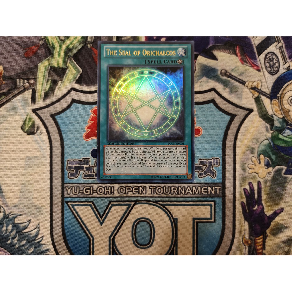 Thẻ bài Yugioh chính hãng The Seal of Orichalcos - LC03-EN001 - Ultra Rare 1st Edition