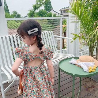 Đầm hoa hở lưng cho bé gái