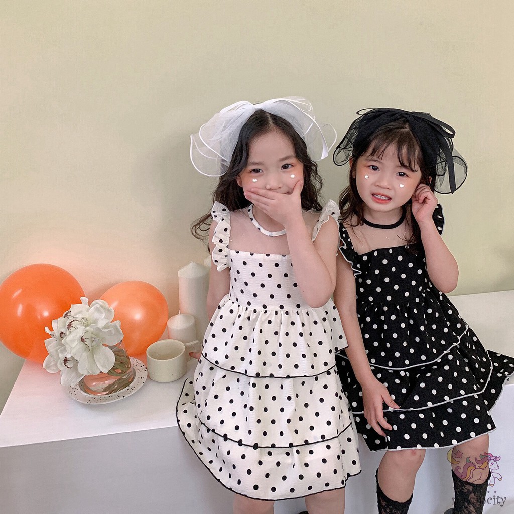 Đầm Công Chúa Không Tay Họa Tiết Chấm Bi Phối Bèo Phong Cách Hàn Quốc Cho Bé Gái