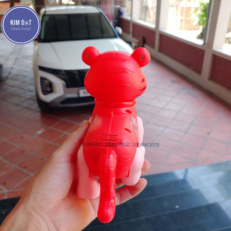 Đồ chơi hổ chạy pin có đèn sáng , có nhạc , đồ chơi cho bé đồng giá . có kèm dây để các bé dắt