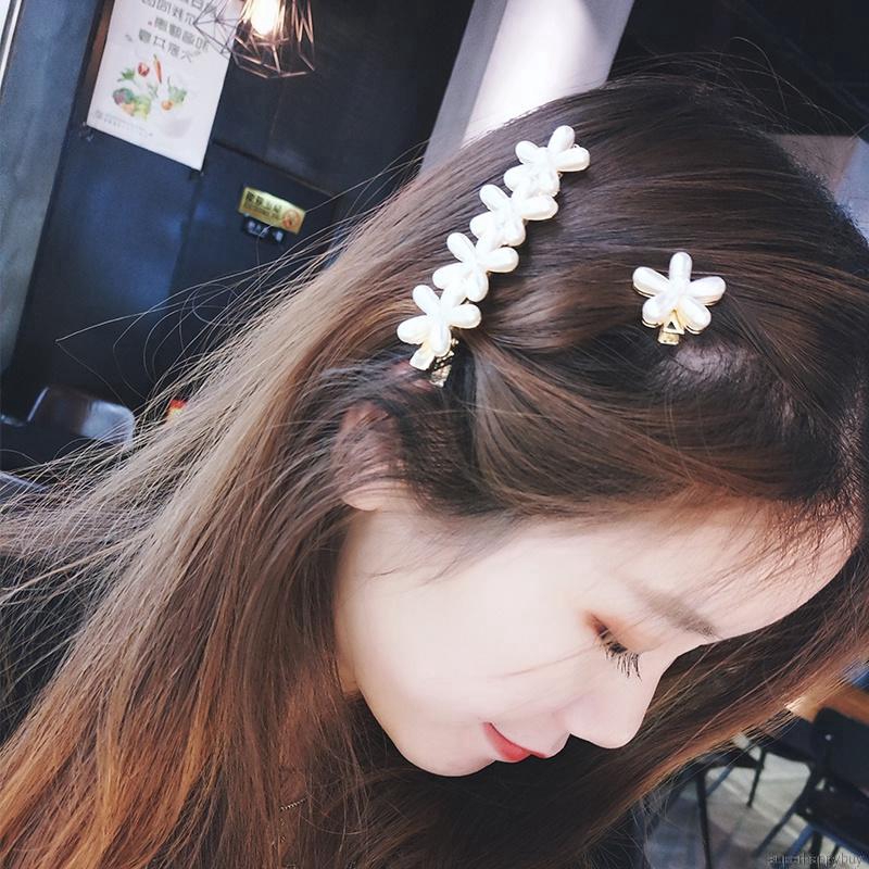 Kẹp tóc hoa dễ thương cho bé gái