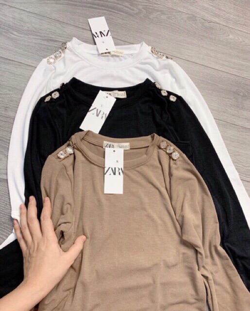 Xả- Áo thun giấy dài tay cổ tròn khuy vai