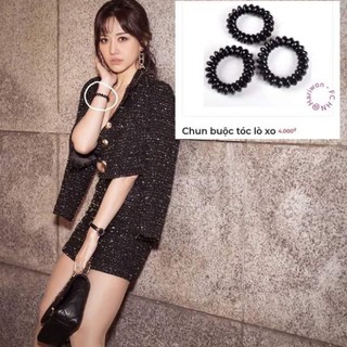 cột tóc lò xo