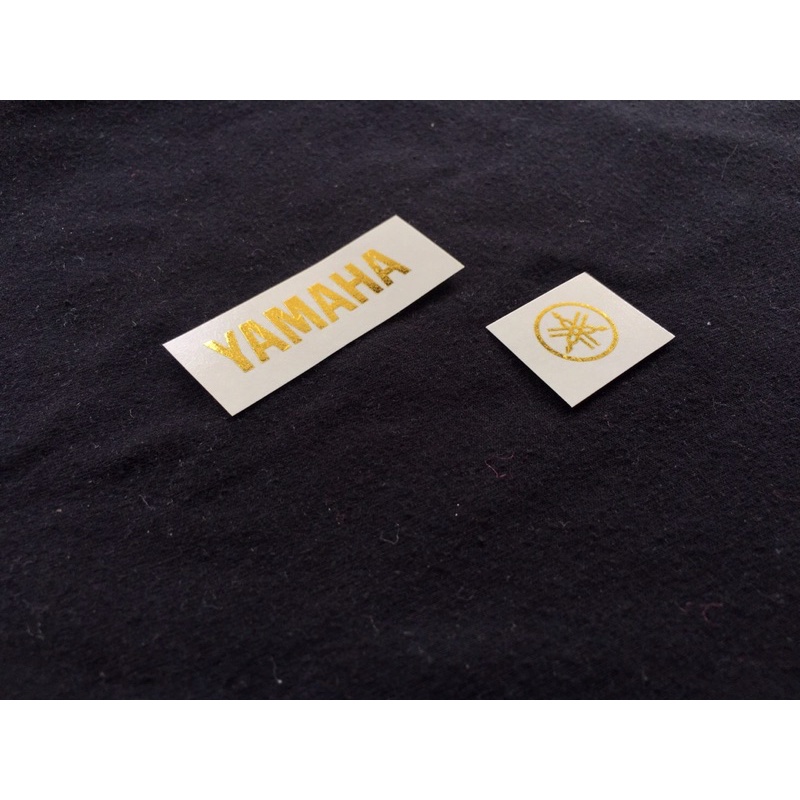 Logo đầu đàn Guitar Acoustic Yamaha