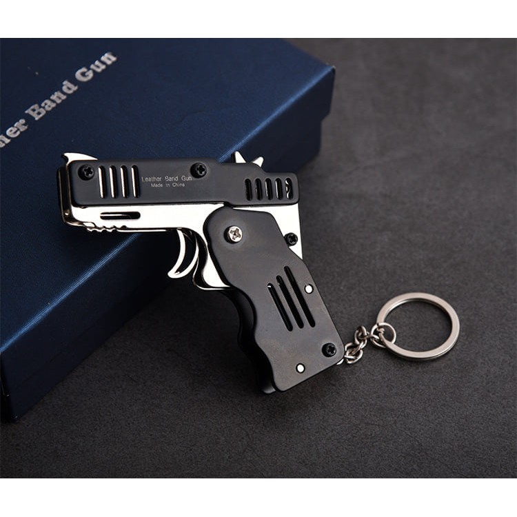 Đồ chơi Súng bắn thun móc chìa khoá dạng đồ chơi gấp gọn, tặng kèm dây chun