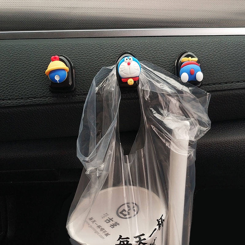 Móc treo đồ gắn phía trước xe hơi hình hoạt hình đa năng tiện dụng