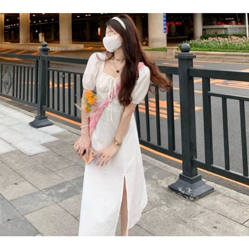 Đầm trắng thiết kế , đầm trắng xẻ tà dúm ngực thắt nơ , đi chơi , đi biển , dự tiệc siêu sang