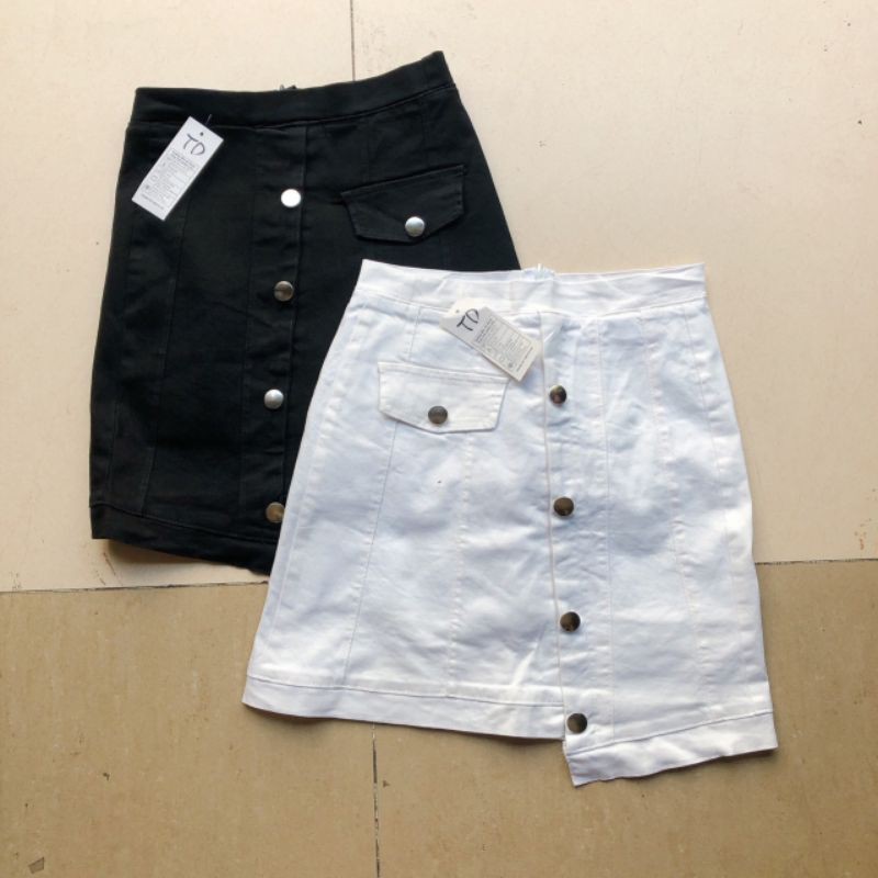 Chân váy kaki nút xéo 1 bên may quần trong