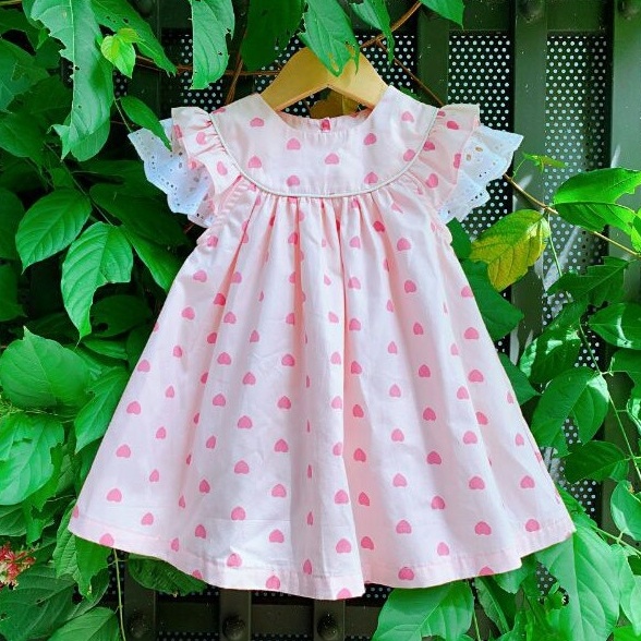 Đầm bé gái tim hồng tay cánh tiên phối ren