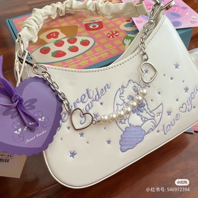 Túi xách kẹp nách cat secret garden màu tím siêu xinh