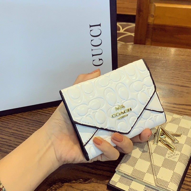 Ví COACH cầm tay