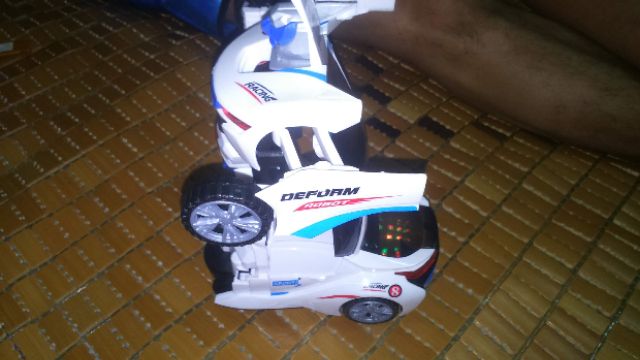 Xe chạy PIN biến thành Robot có nhạc và đèn Led rất đẹp (tặng kèm PIN)