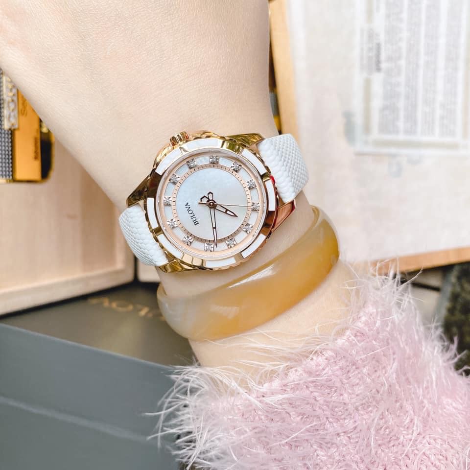 Đồng hồ Nữ hàng hiệu Bulova 98P119, mặt trắng khảm trai, cọc số đính hạt, dây da, kính cứng - Máy quartz