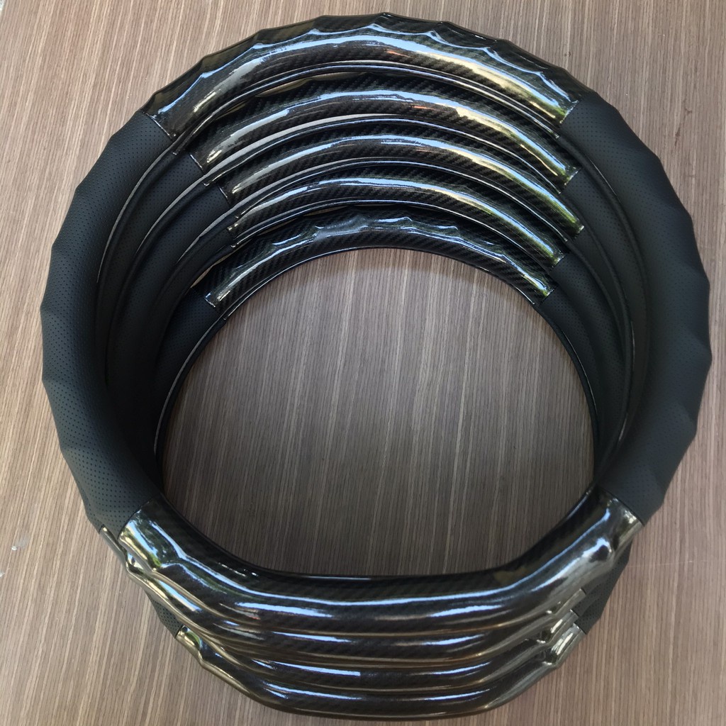 Bọc vô lăng ô tô kiểu dáng dcut cho xe kia seltos, xl7, k5, VFE34, VF8 etriga, sonet,almera, kick, territory, custin