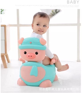 Bô vệ sinh hình chú lợn đáng yêu cho bé.